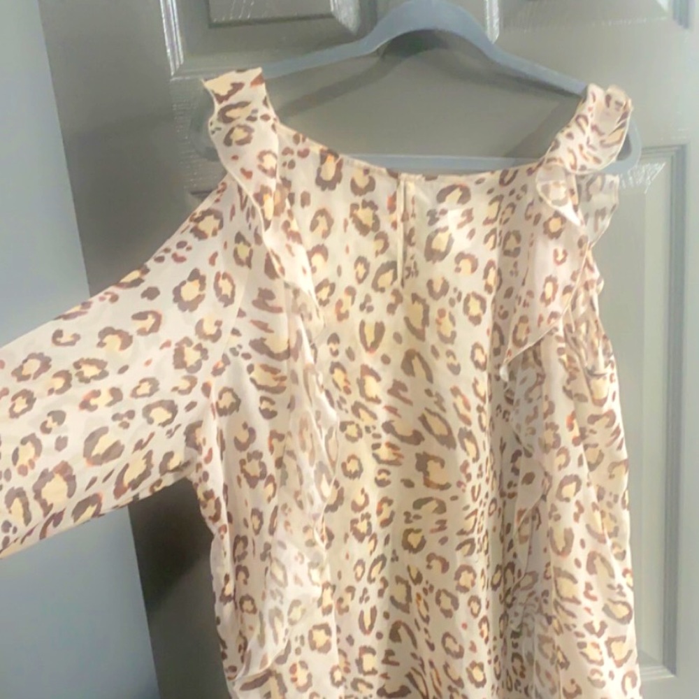 Sheer cold shoulder animal print top